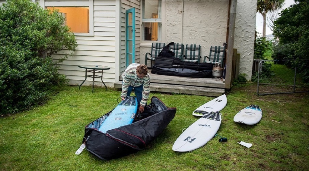 How do I prevent mildew in my wetsuit while traveling