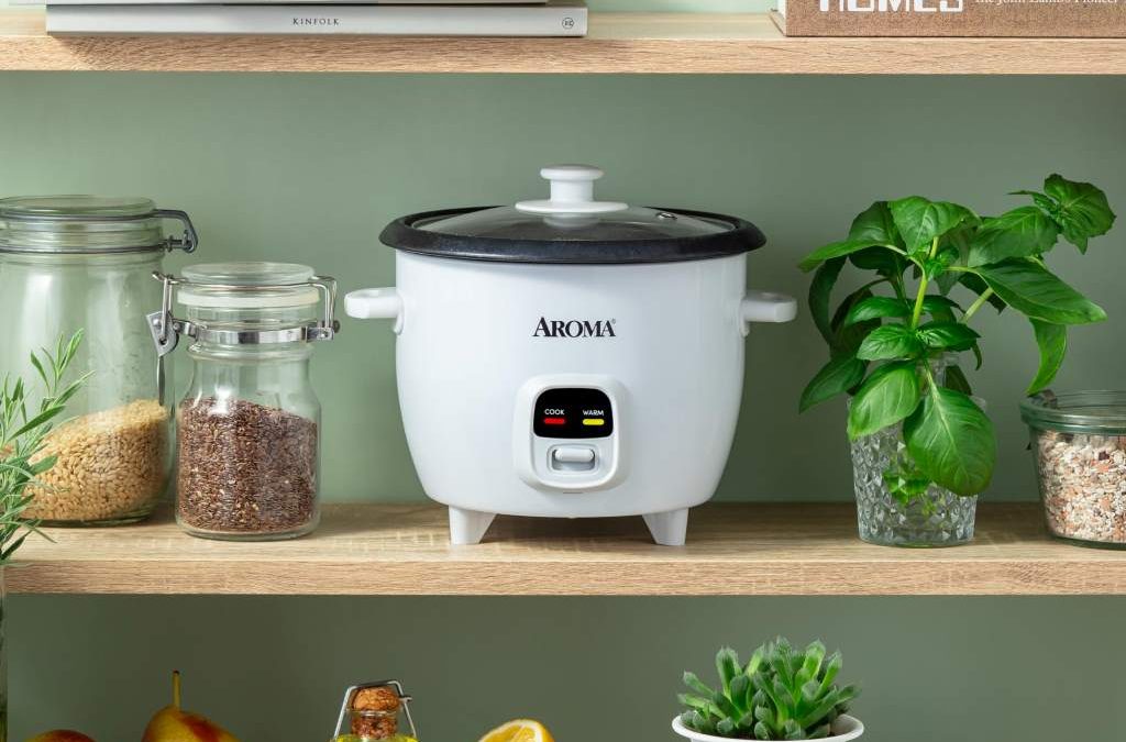 Compact Aroma 2-cup mini rice cooker with steam vent on kitchen counter ready for use