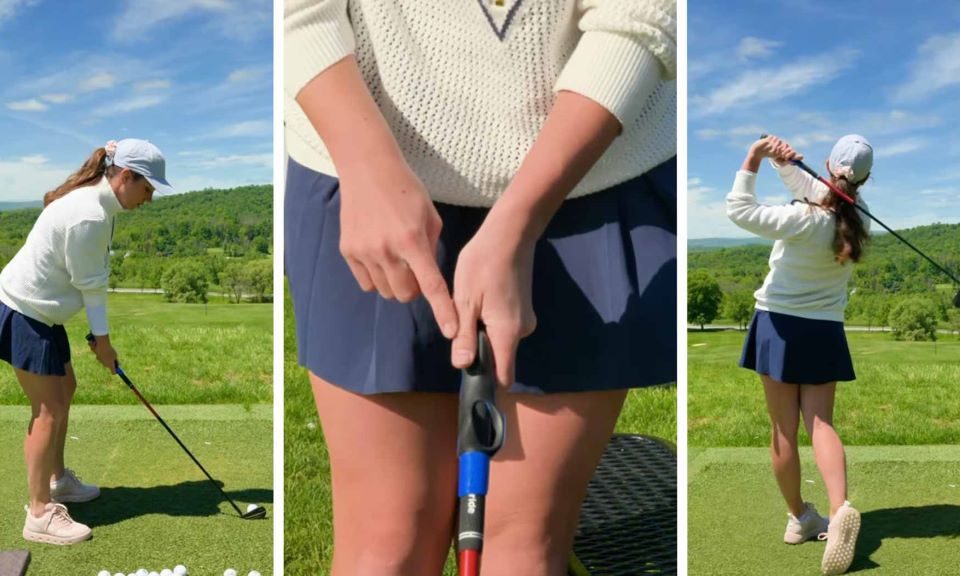 Golfer practicing grip technique using a golf training aid on club