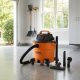 Amazon Basics shop vacuum in a bright garage workspace.